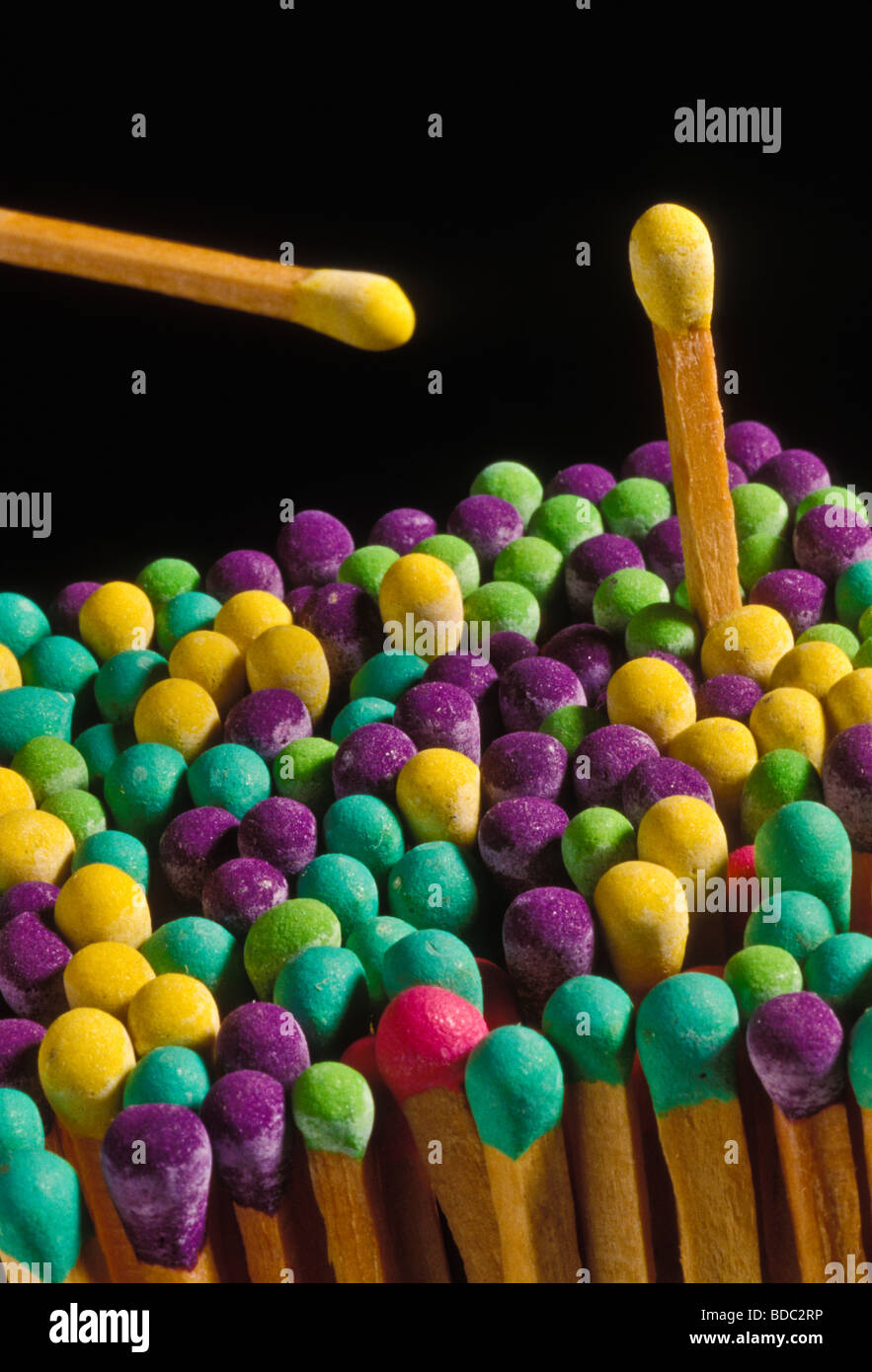 close up color matches red yellow blue green purple. Black background