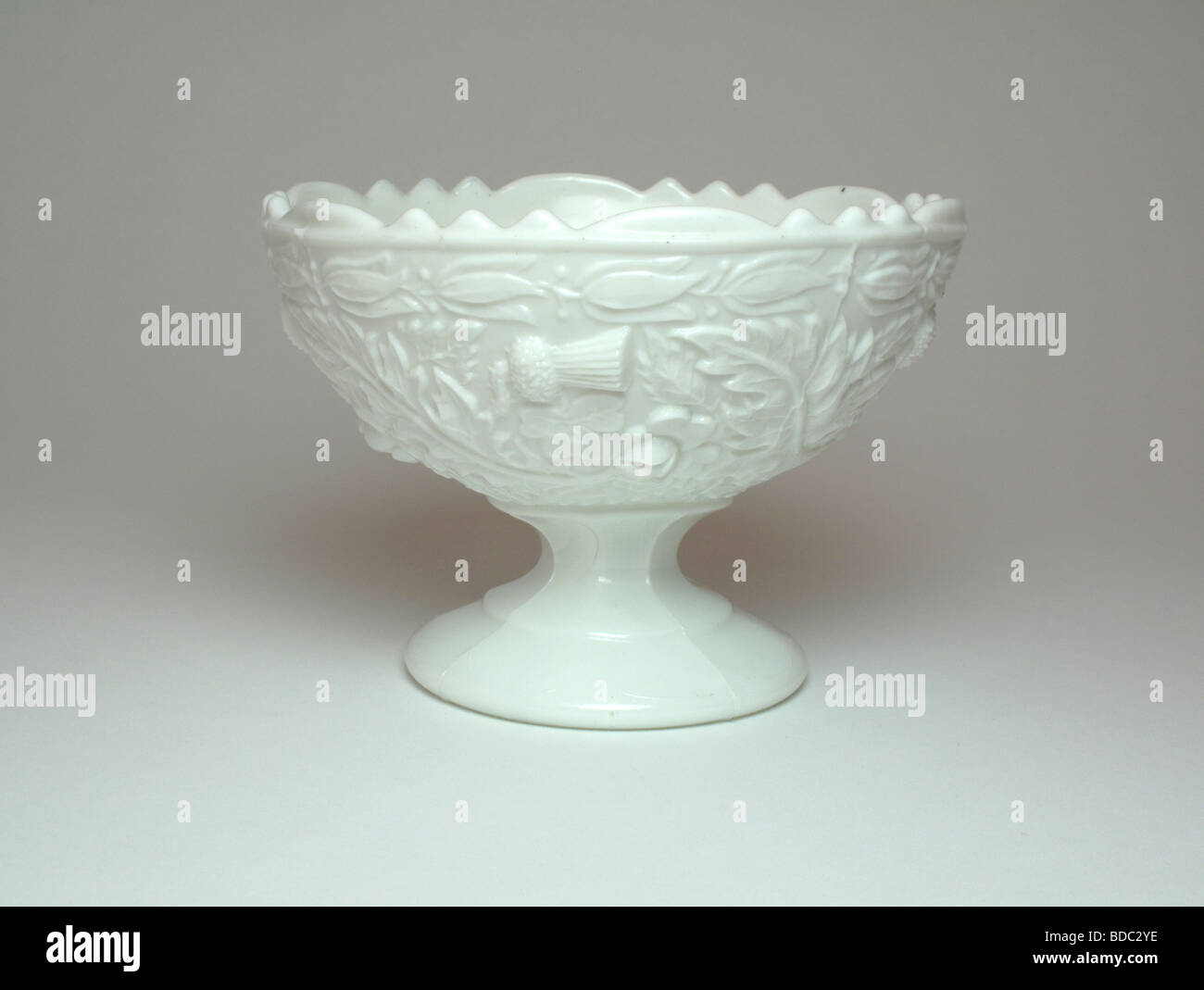Henry Greener pressed white glass bowl Stock Photo