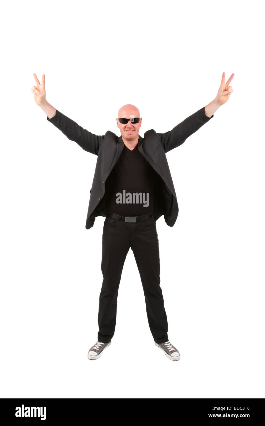 bald headed man, holding both arms upwards by showing the victory sign Stock Photo