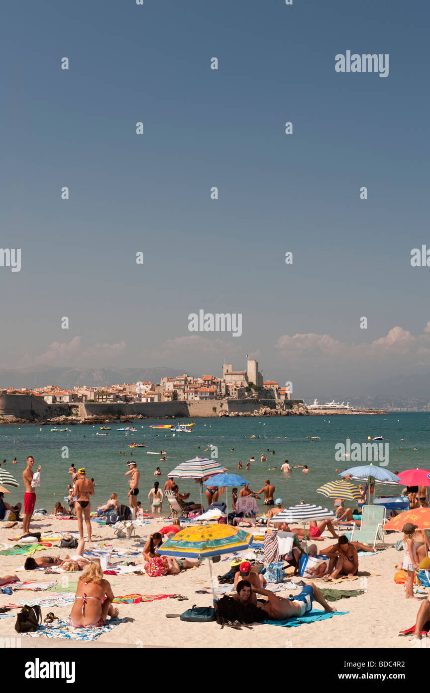 View across Plage du Ponteil to Le Vieil Antibes and yachts in the anchorage Stock Photo