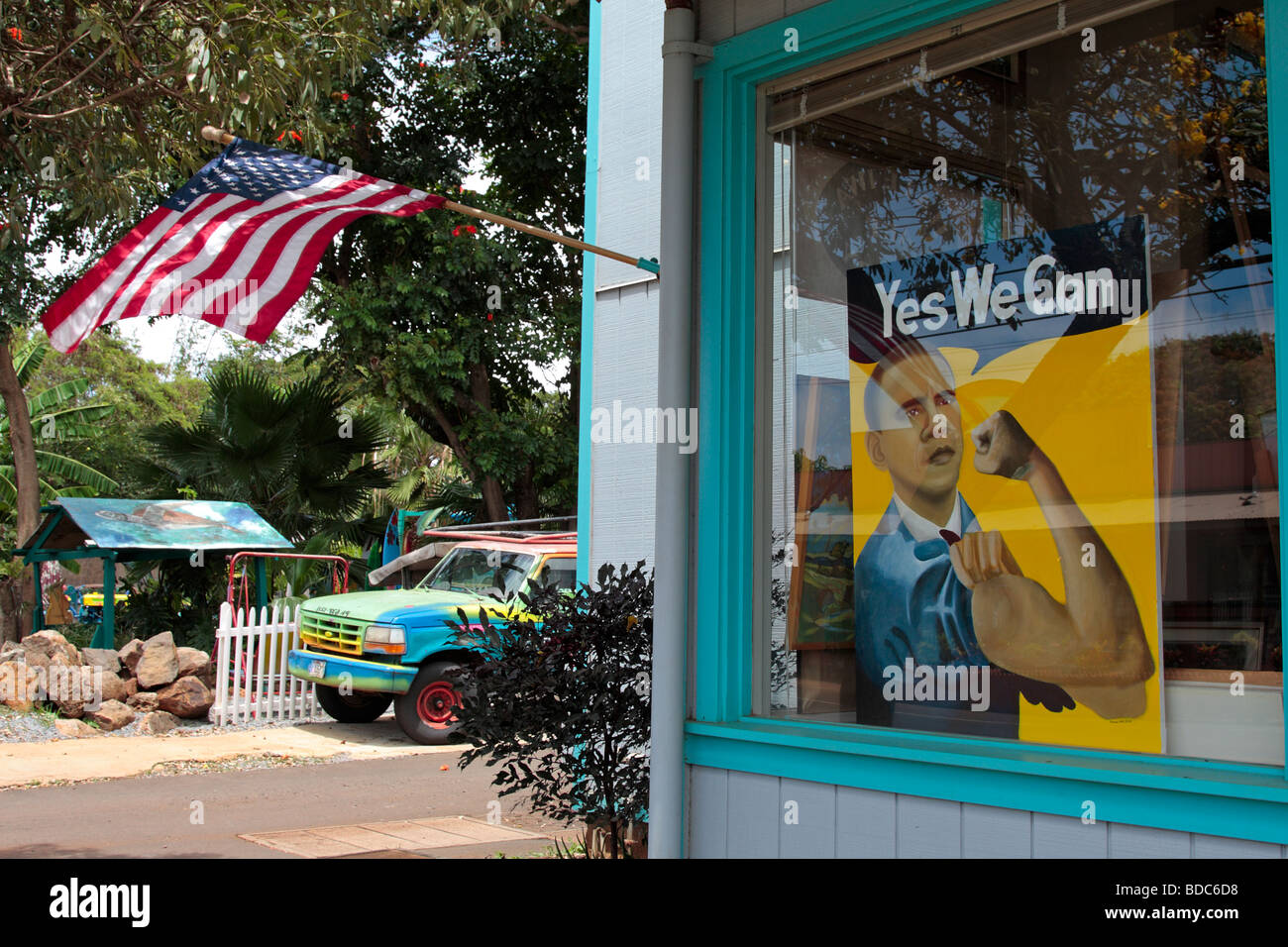 Barack Obama depicted in a painting mimicing a second world war poster in a gallery window in Haleiwa on Oahu Hawaii Stock Photo