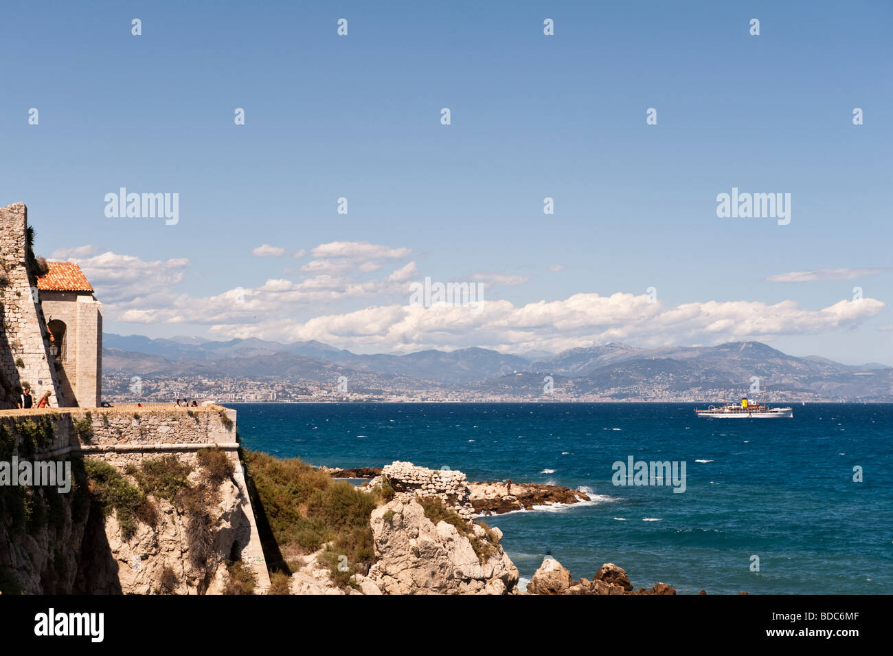 View of the walls of the old town of Antibes and the anchorage Stock Photo