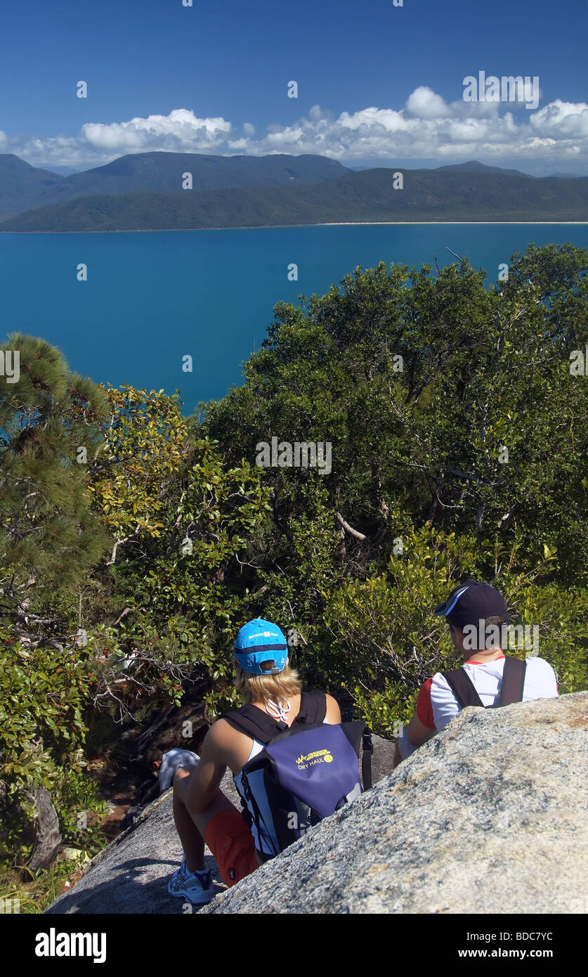 Hikers enjoy the view from Boulder Lookout on the summit of Fitzroy Island National Park Queensland Australia No MR Stock Photo