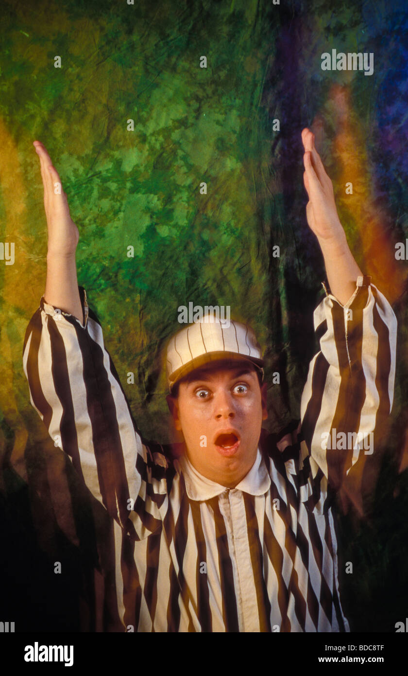 Touchdown Umpire Young sport umpire referee signals scoring touchdown. excitement yell ...