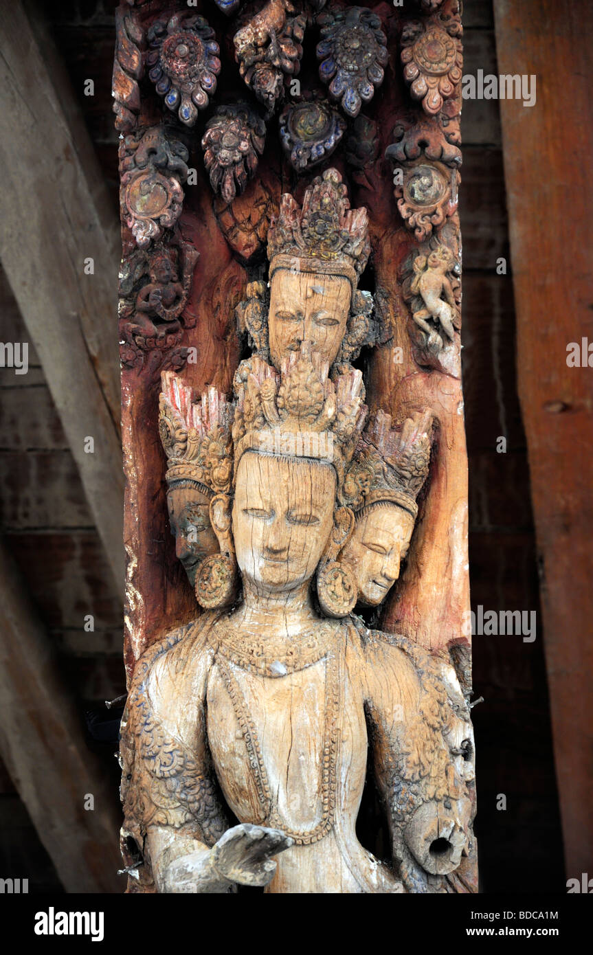 Carved wooden detail facade Jagannath temple near Hanuman Dhoka Durbar Square Kathmandu Nepal god deity face Stock Photo