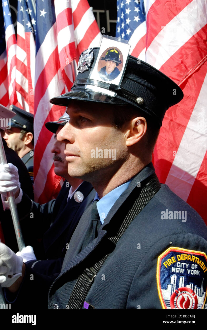 FDNY Firefighter LUKE ALLEN with photo on hat of brother, RICHARD D. ALLEN, a firefighter killed in line of duty 9/11 2001, St. Patrick's Day Parade Stock Photo