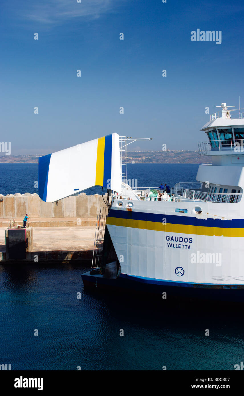 The Gozo-Malta ferry 'Gaudos' docking in Cirkewwa port, Malta. Stock Photo