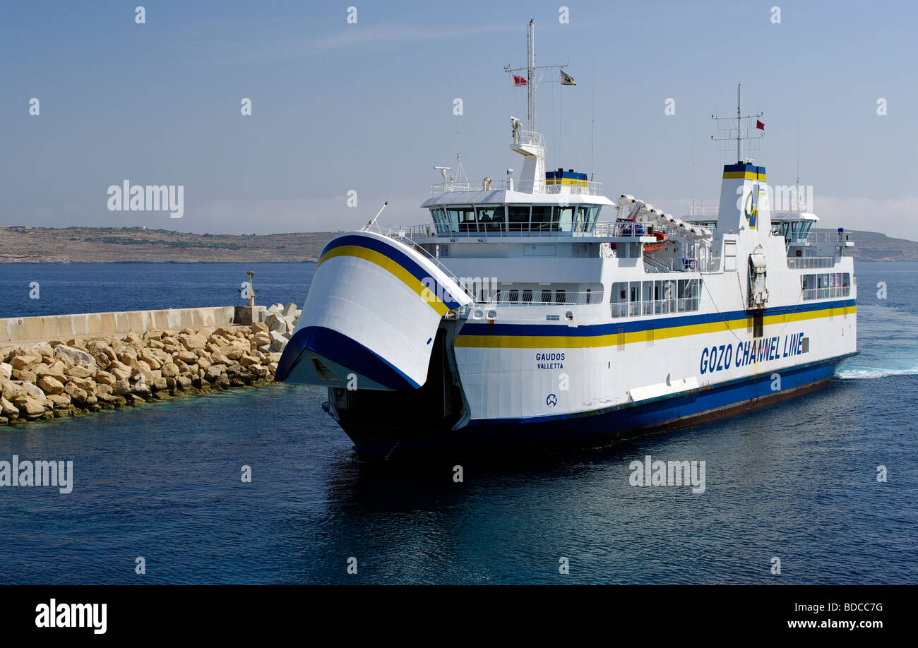 The Gozo-Malta ferry 'Gaudos' arriving in Cirkewwa port, Malta. Stock Photo