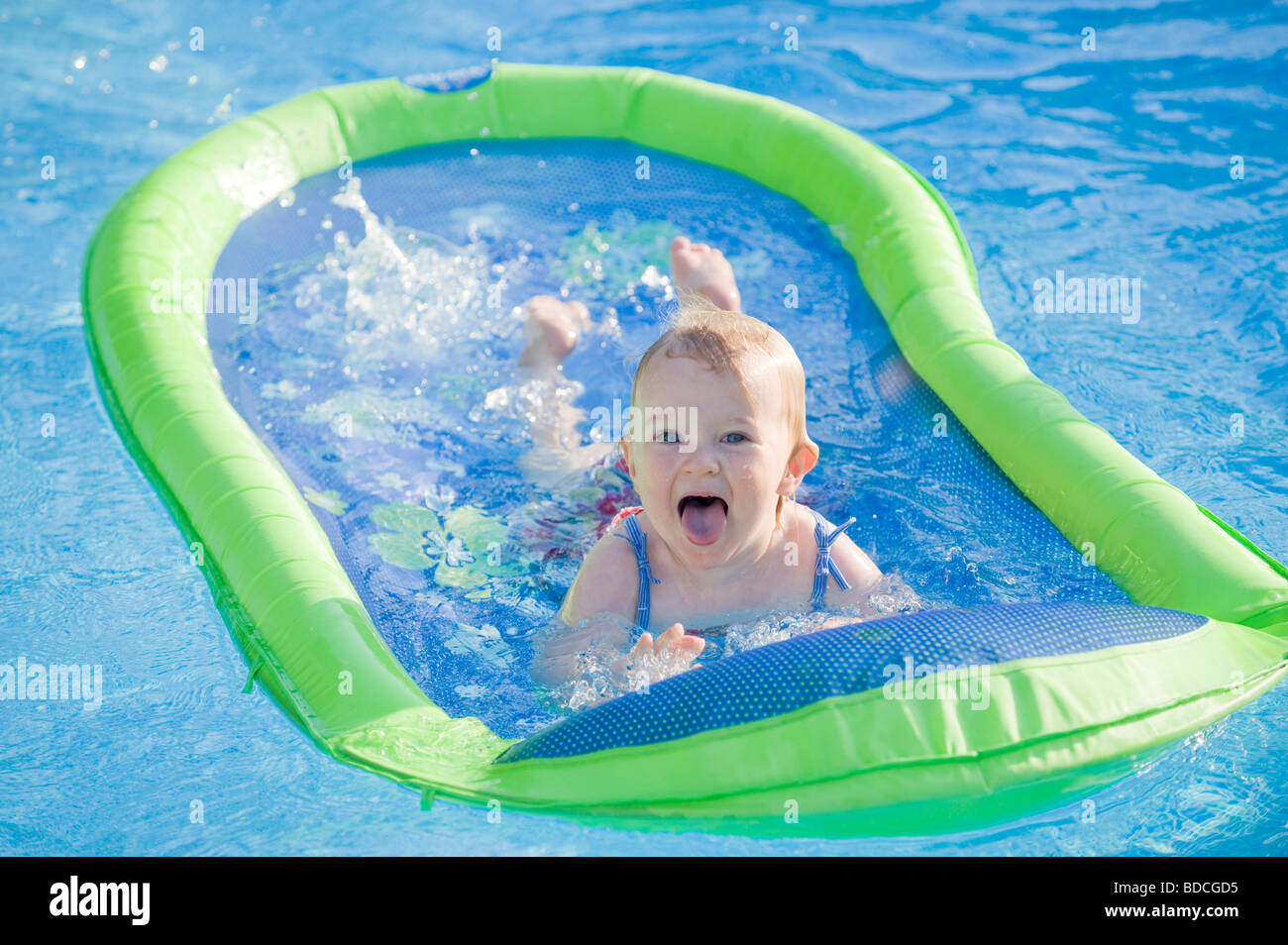 baby floating in pool