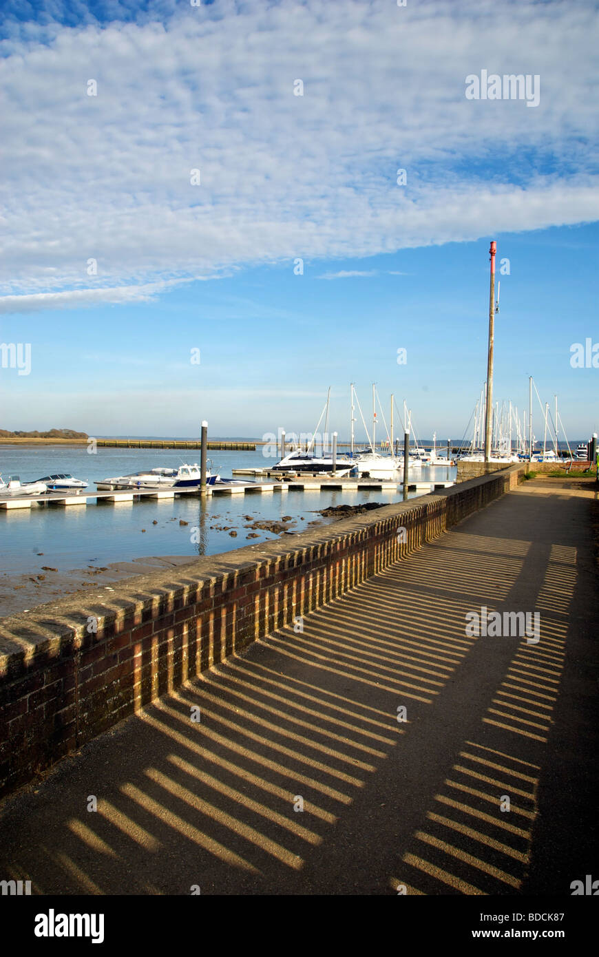 Lymington Marina Hampshire UK Promenade Fence Shadows Sailing Boats