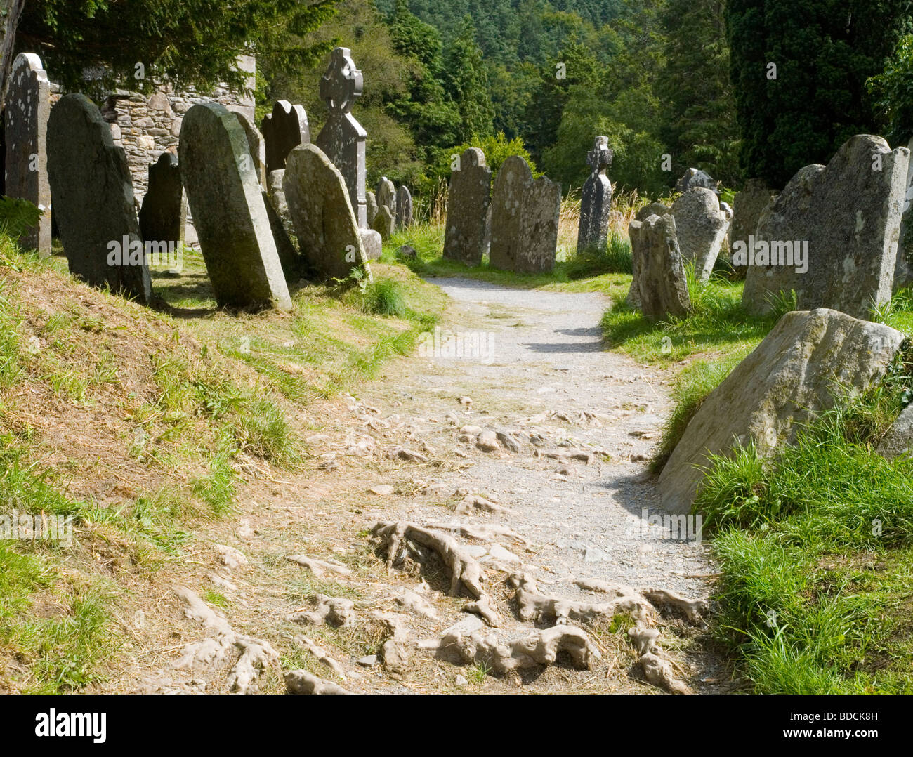 Gravestones lining a path at Glendalough in County Wicklow, Republic of Ireland Summer 2009 Stock Photo