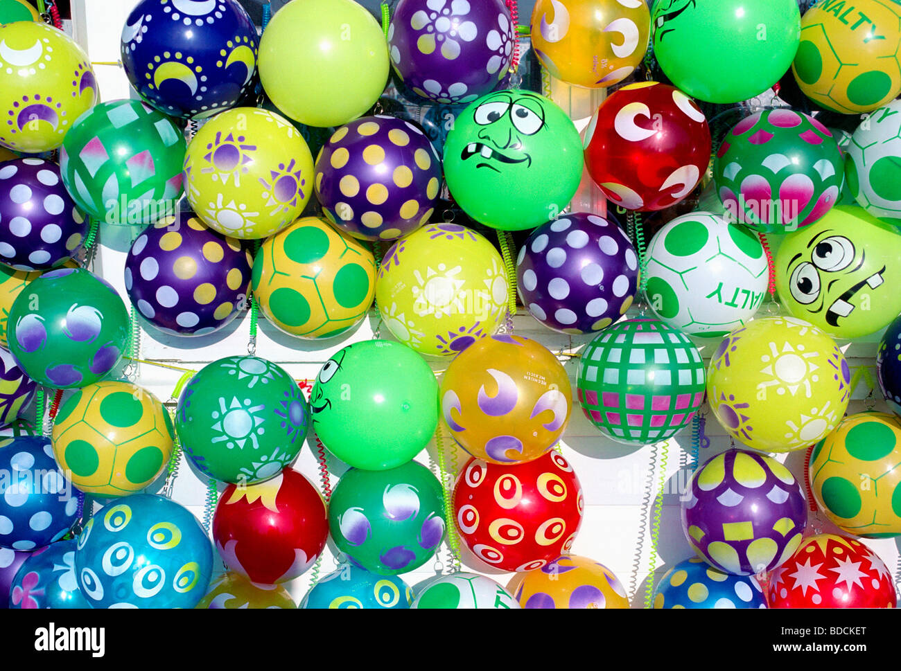 A collection of brightly coloured footballs Stock Photo Alamy