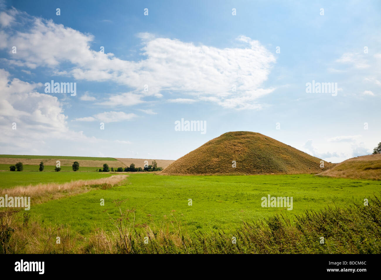 View of the neolithic monument of Silbury Hill and surrounding countryside in Wiltshire, England, UK Stock Photo