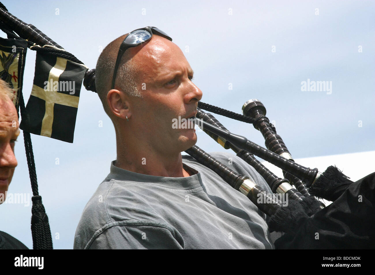 Cornish musicians playing instruments including bagpipes &