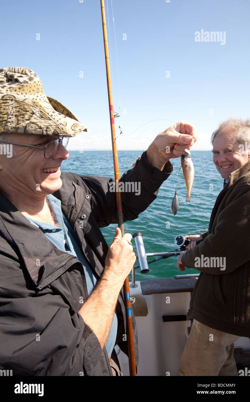 Sea fishing on the Sea Fox charter boat Portsmouth England Stock Photo