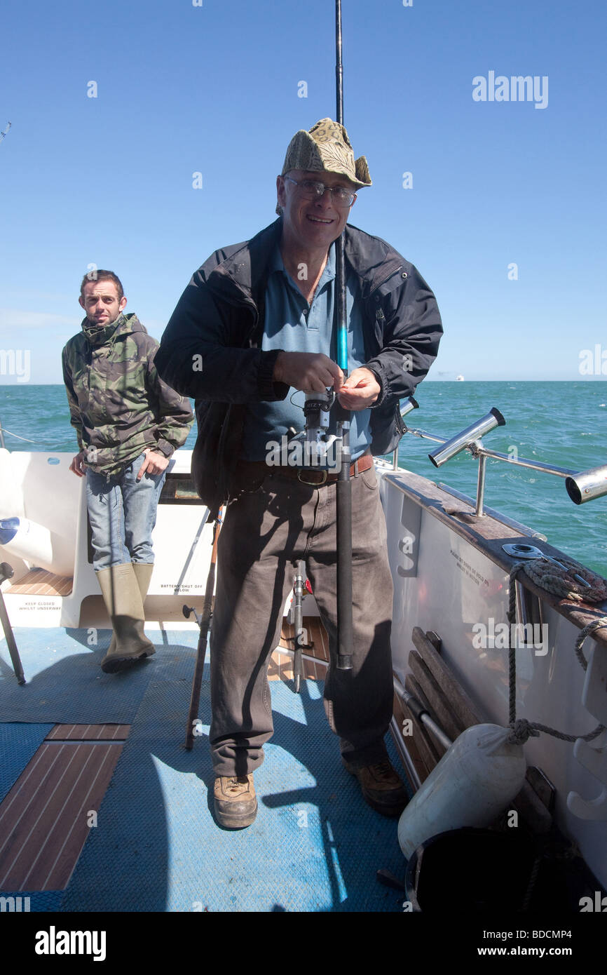 Sea fishing on the Sea Fox charter boat Portsmouth England Stock Photo
