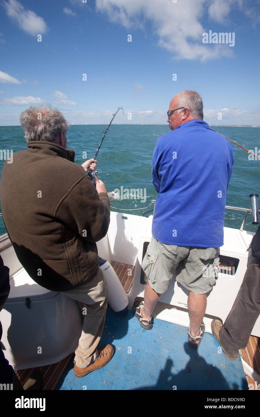 Fishing on the Sea Fox charter boat from Portsmouth England  Stock Photo