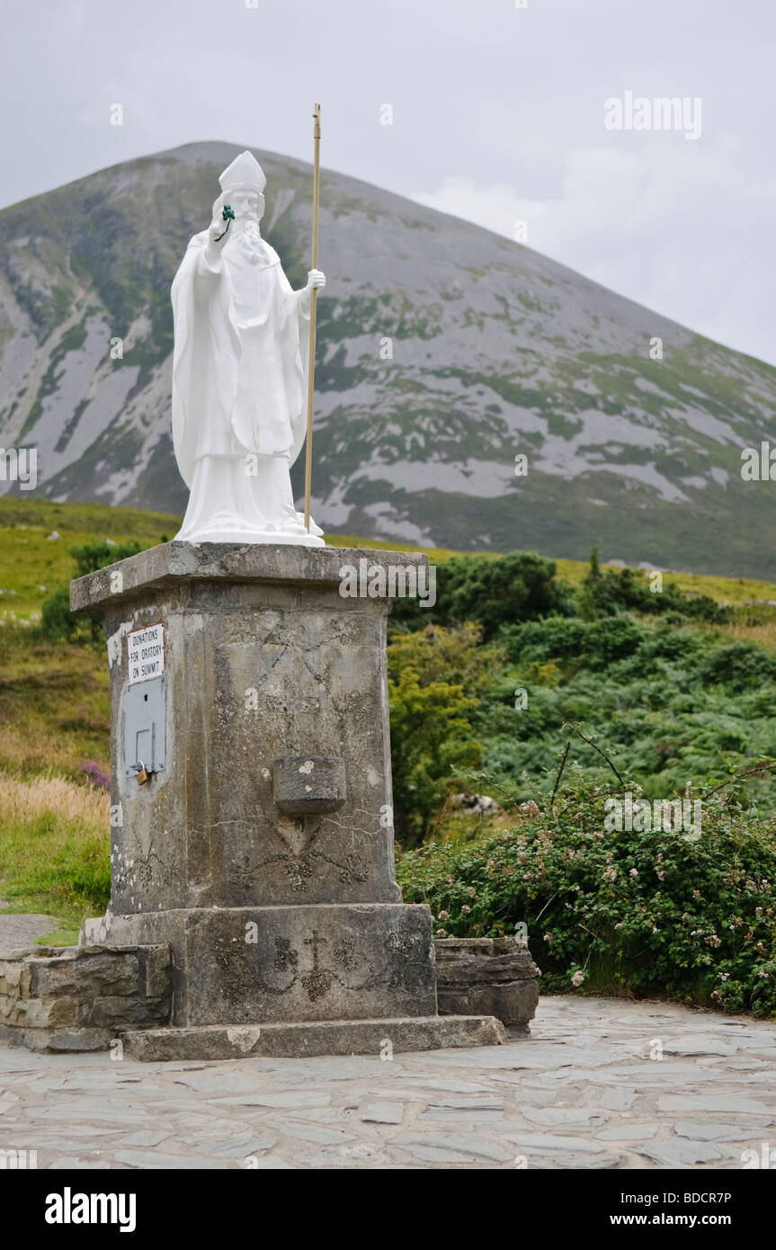 Statue of Saint Patrick at the foot of Croagh Patrick mountain Stock Photo