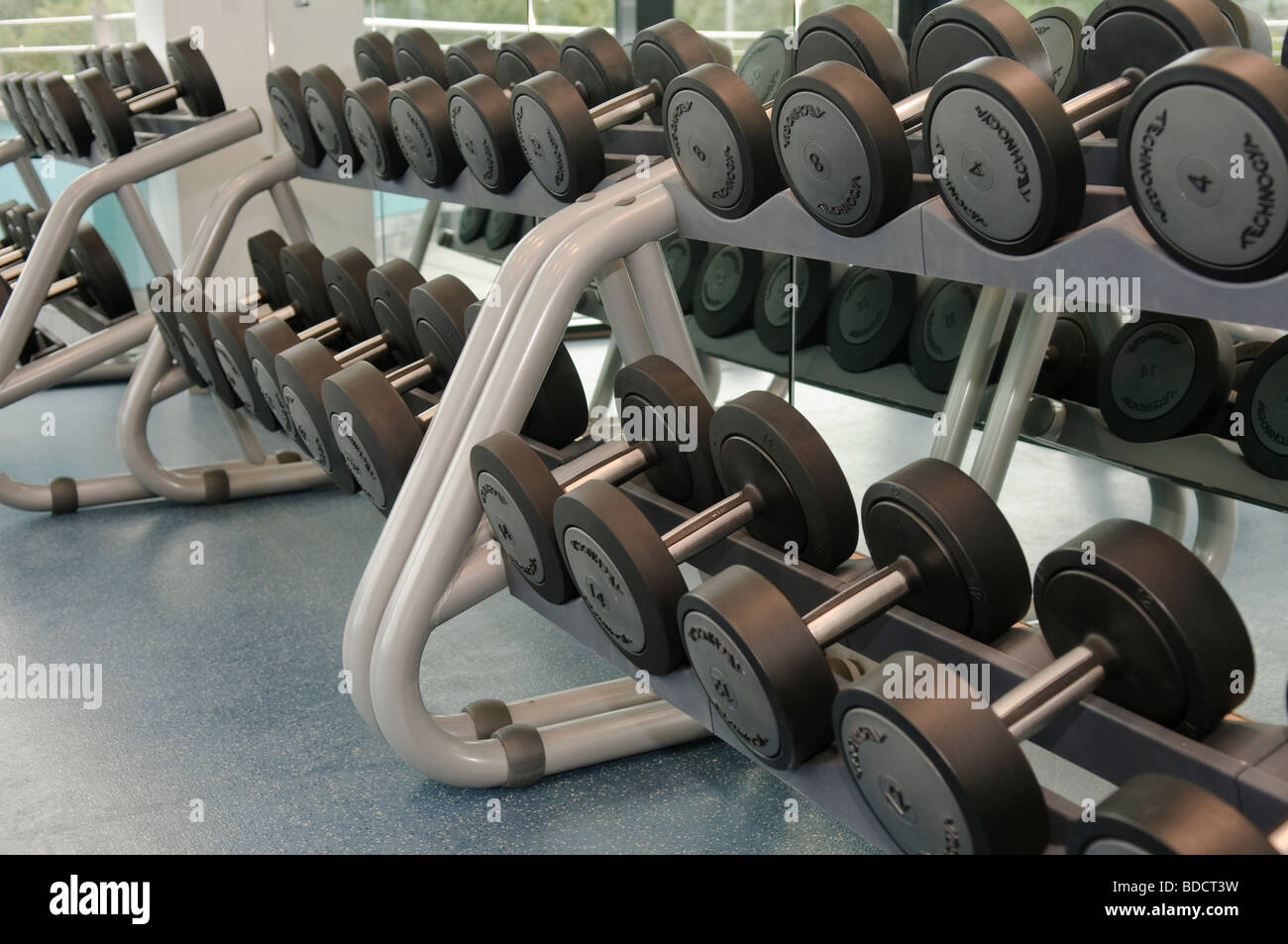 Rack of dumbbells in a gymnasium Stock Photo