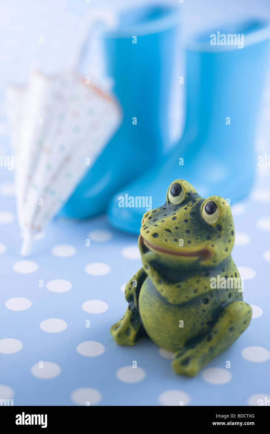 Frog ornament and rain boots Stock Photo - Alamy