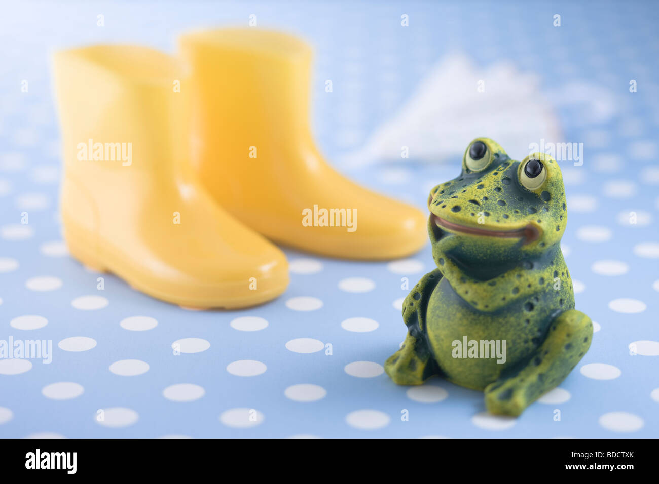 Frog ornament and rain boots Stock Photo - Alamy