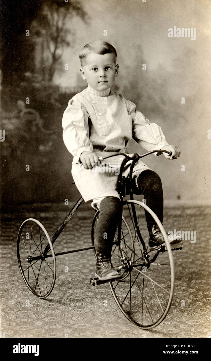Handsome Little Boy on Tricycle Stock Photo Alamy