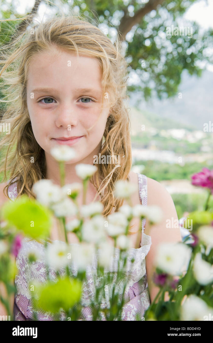 Portrait of a girl with flowers Stock Photo - Alamy