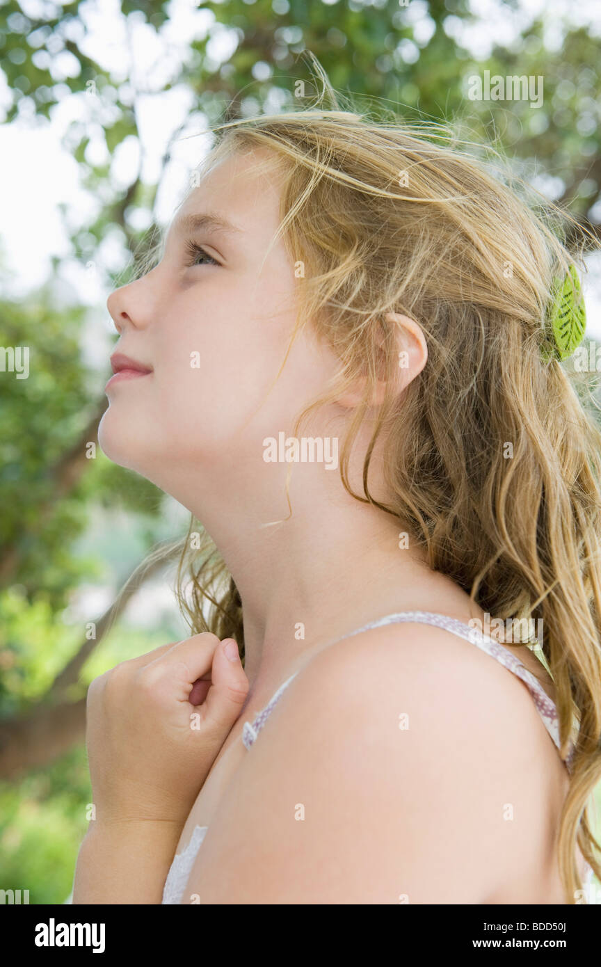 Close-up of a girl looking up Stock Photo - Alamy