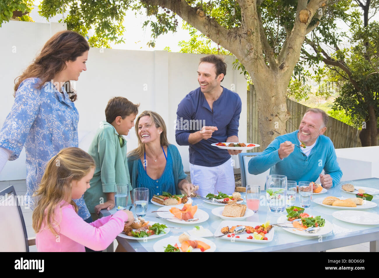 Family having breakfast at the dining table Stock Photo - Alamy