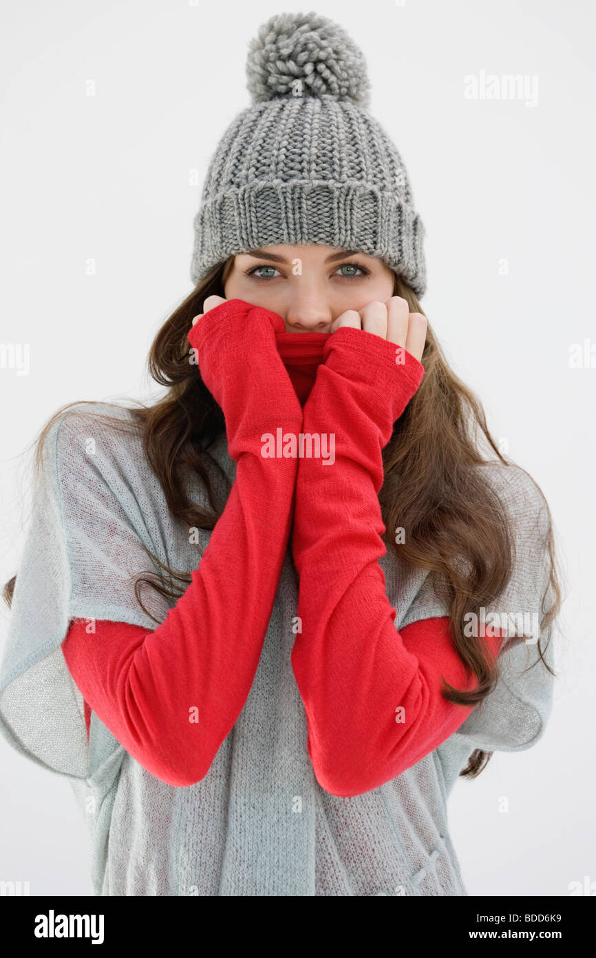 Portrait of a woman covering her face Stock Photo - Alamy