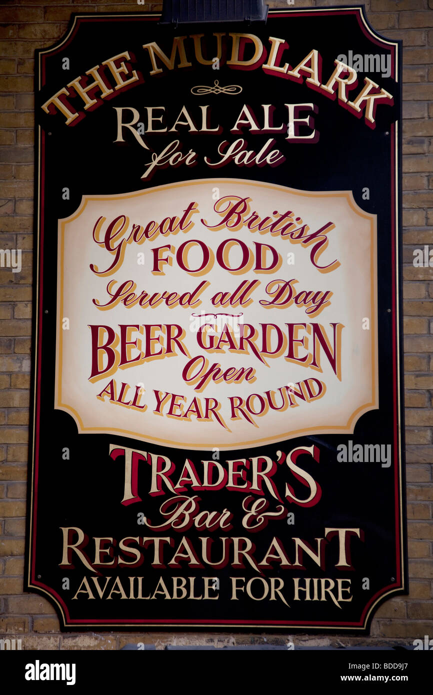 Pub sign advertising Real ale, beer garden food and atmosphere, at the Mudlark, London. Stock Photo