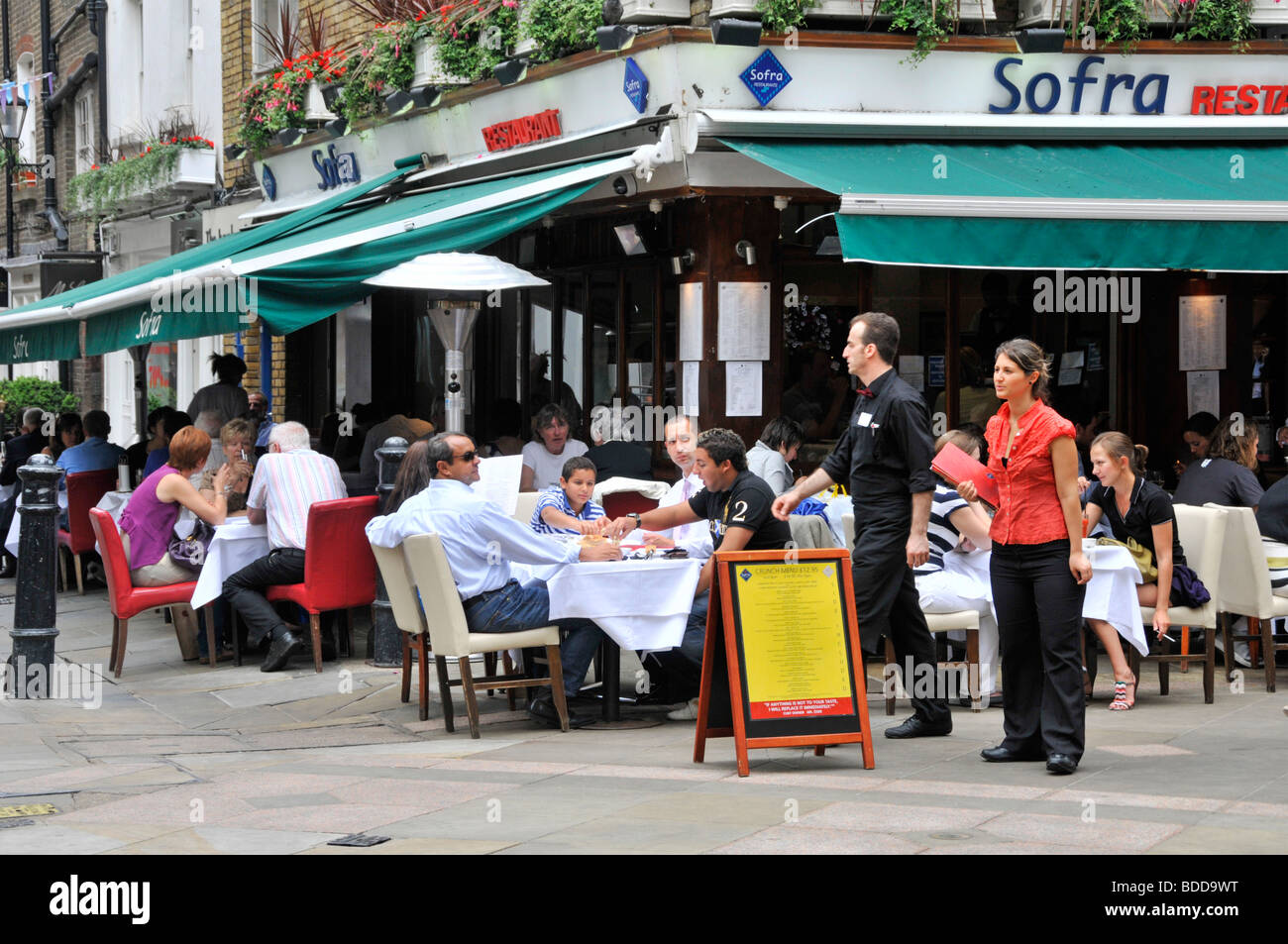 Pavement cafe bars & restaurants in West End London at St Christophers Place just off Oxford Street Stock Photo