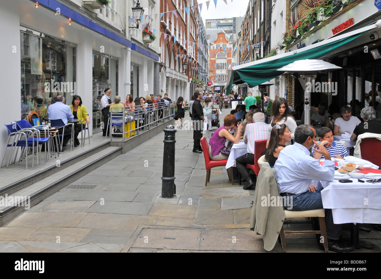 Pavement cafe bars & restaurants in West End of London at St Christophers Place just off Oxford Street Stock Photo