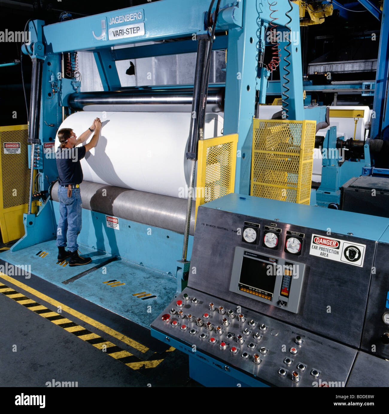 Workers at a roll paper manufacturing facility Stock Photo Alamy