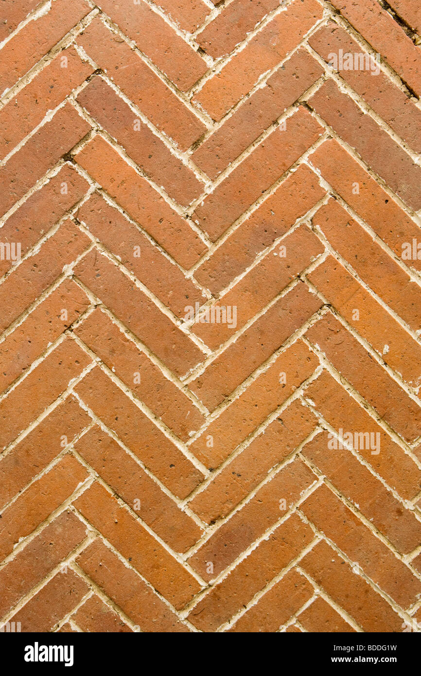 Brick paving in herringbone pattern. Stock Photo