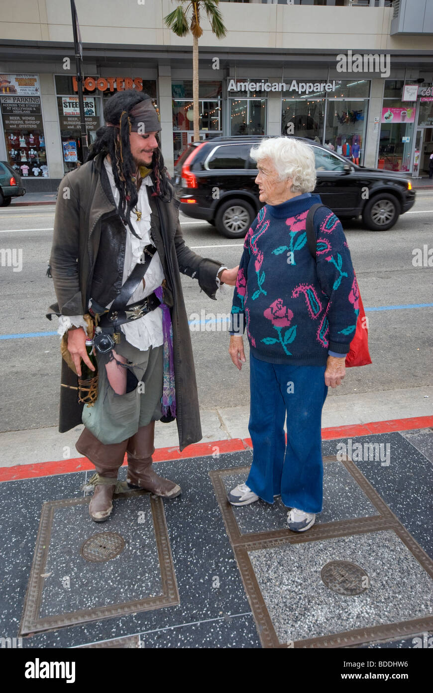Captain Jack Sparrow character and tourist at Hollywood Walk of Fame, Hollywood, California, USA Stock Photo