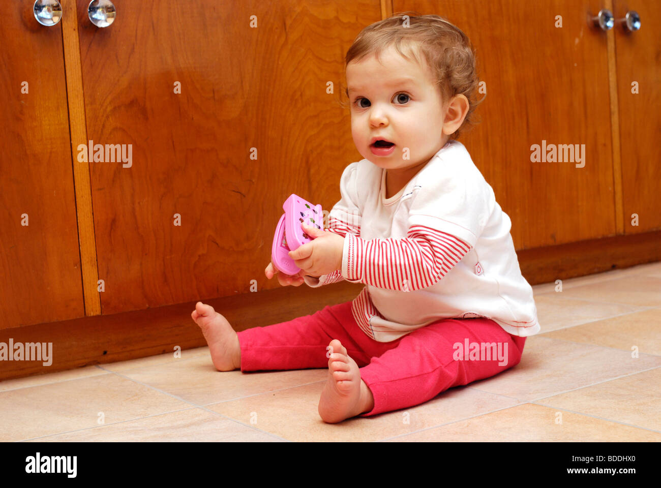 Baby Using Play Phone Toy mobile phone hi-res stock photography and images - Alamy