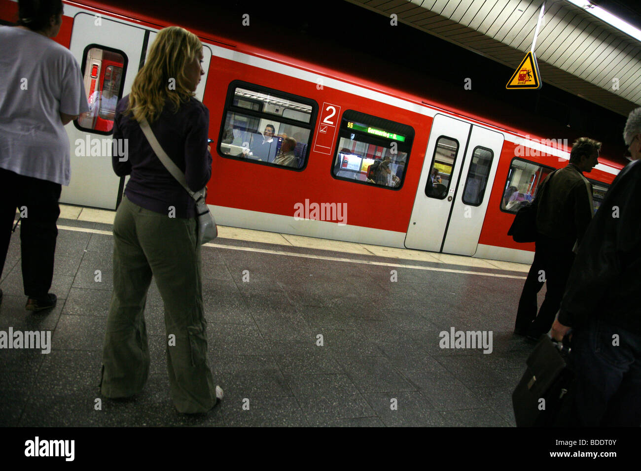 Platform in a station of the Munich underground as a train arrives. Bavaria, Germany. Stock Photo