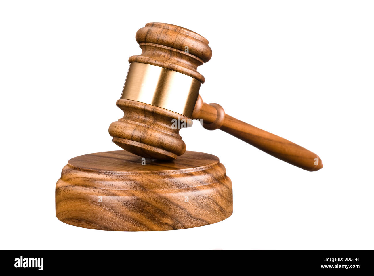 A gavel and wooden block isolated on white for use with any legal or auctioneer inferences. Stock Photo