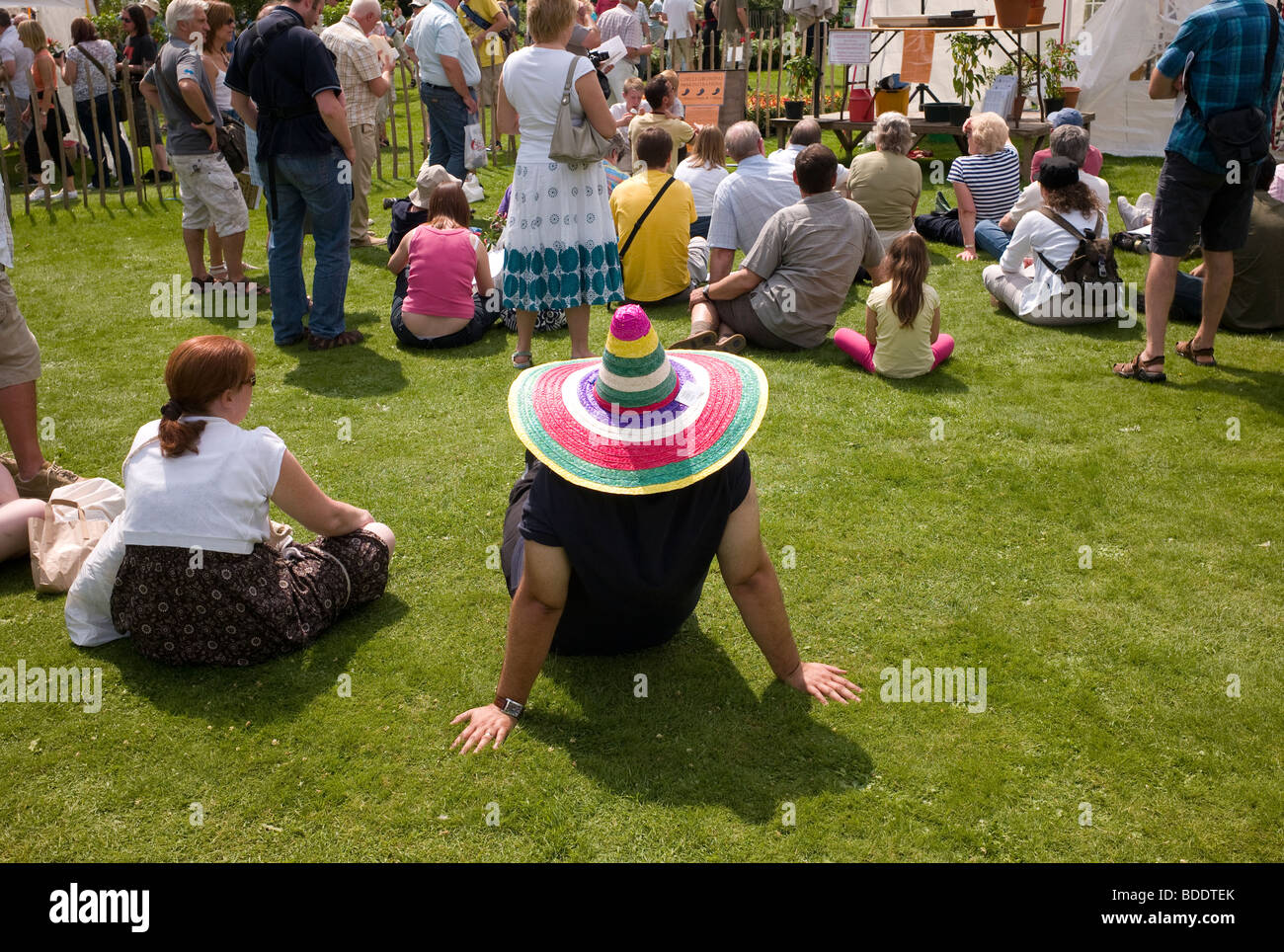 Man wearing sombrero bought at Chilli festival Stock Photo