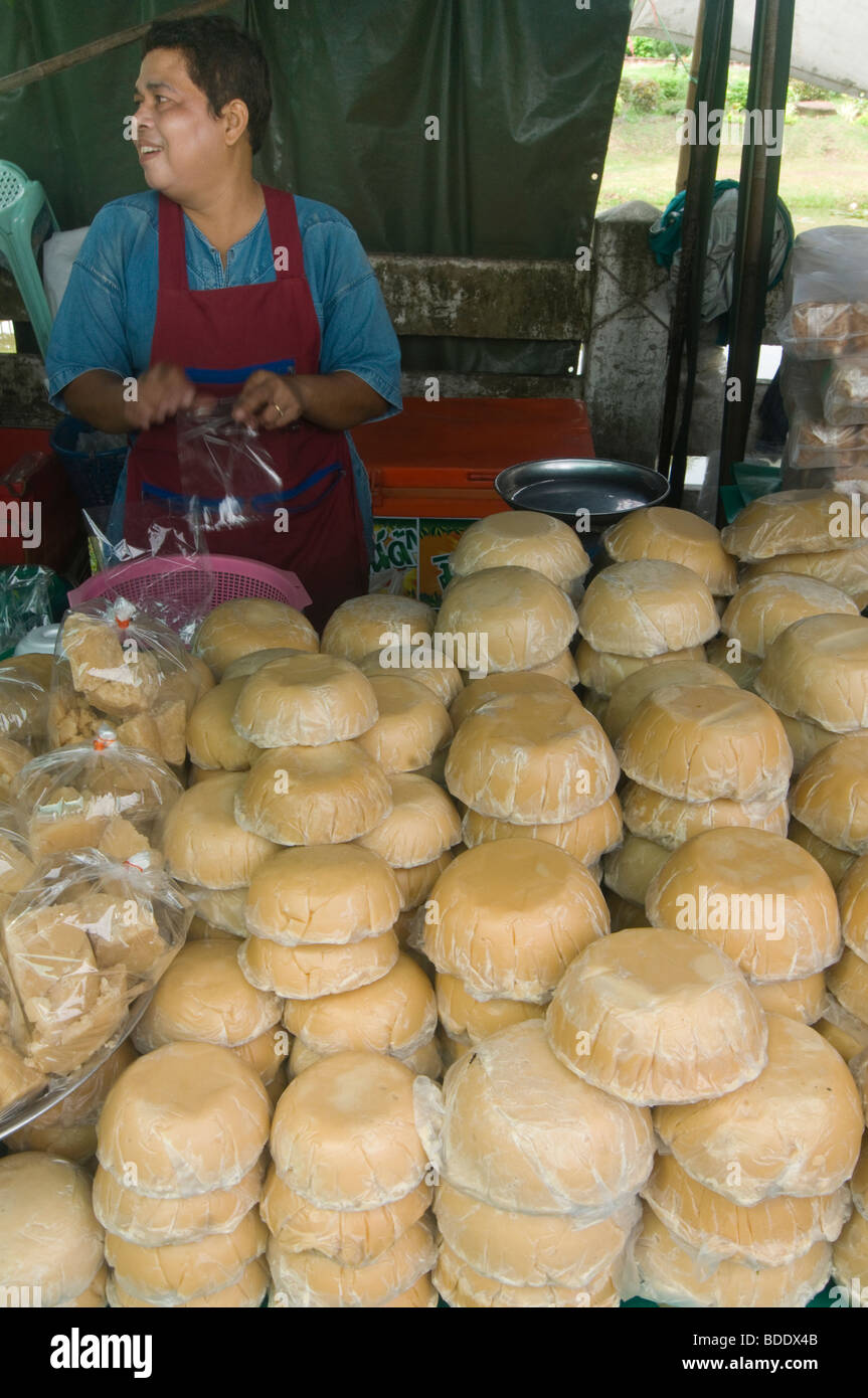 palm sugar vendor at a market in Bangkok Thailand Stock Photo Alamy