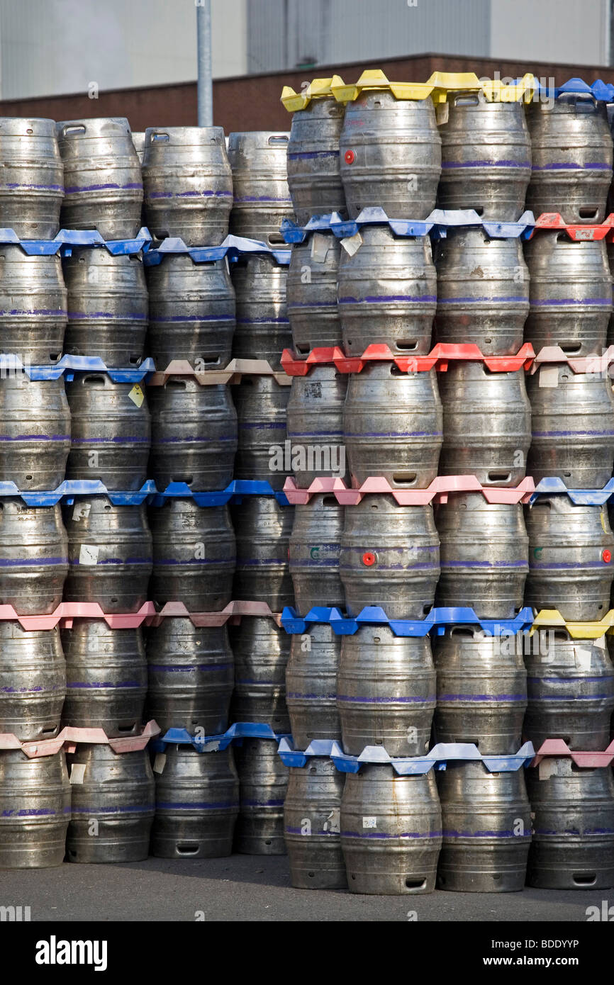 Beer kegs stacked outside a brewery Stock Photo