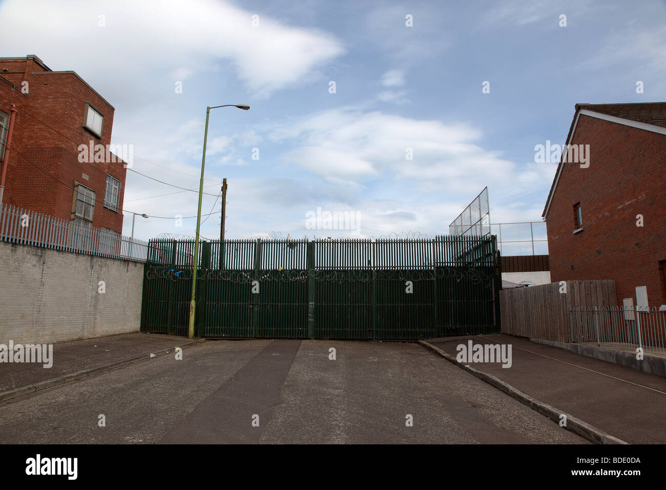 IRELAND, North, Belfast, West, Falls Road, Peace Line barrier between the Catholic Lower Falls and Protestant Shankill areas. Stock Photo