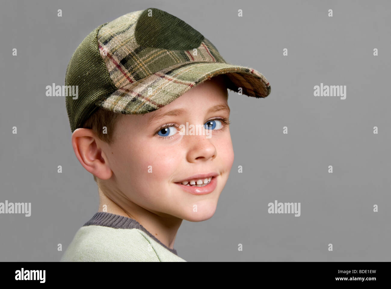 young junior boy wearing baseball cap Stock Photo