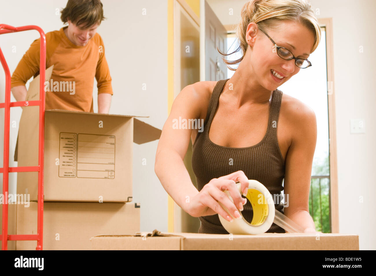 Couple moving and packing. Stock Photo