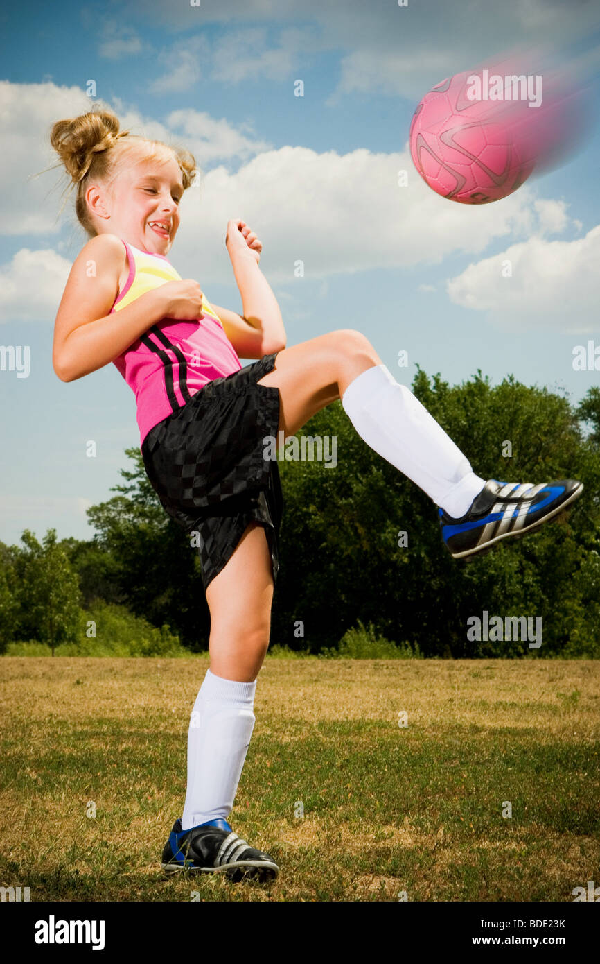 Girl playing soccer. Stock Photo