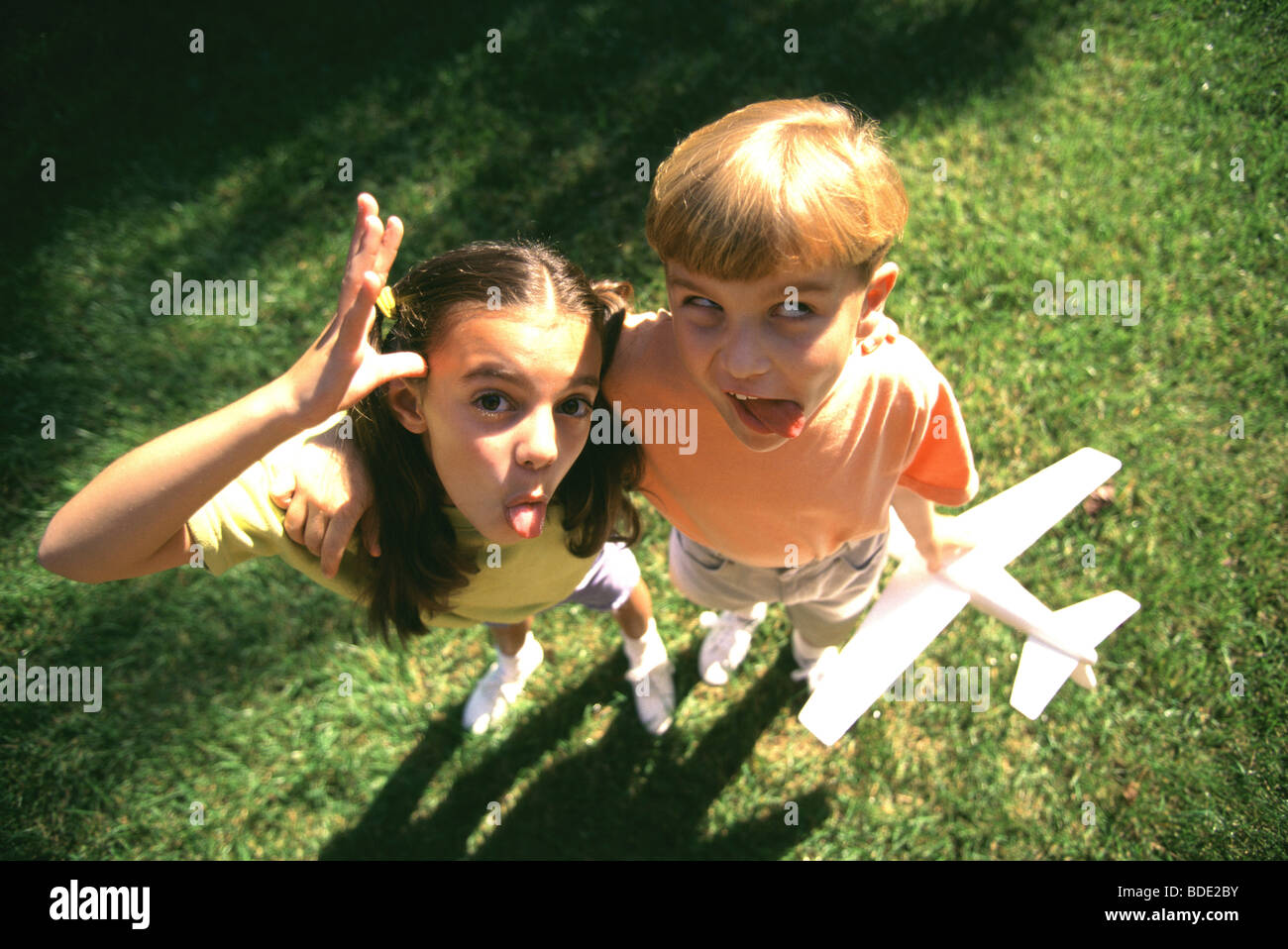 Kids making funny faces stock photo alamy