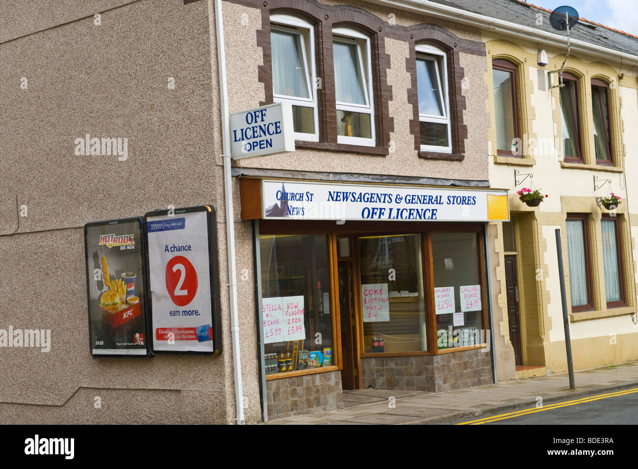 Local corner shop selling cheap booze in Church Street, Ebbw Vale, Blaenau Gwent, South Wales, UK Stock Photo