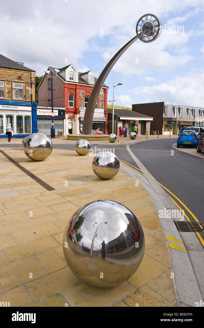 Modern stainless steel sculpture on high street in town centre of Ebbw Vale, Blaenau Gwent, South Wales, UK Stock Photo