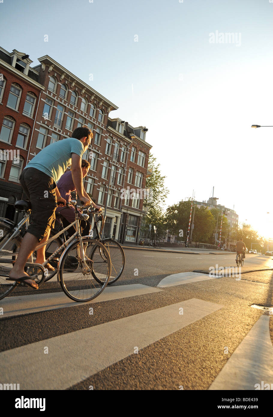 Amsterdam, Holland Man riding bike Stock Photo Alamy